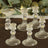 Elegant crystal candle holders in various sizes and designs.