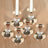 Set of elegant rose gold candle holders with crystal accents.