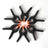Black plastic spring clamps arranged in a circle with orange tips.