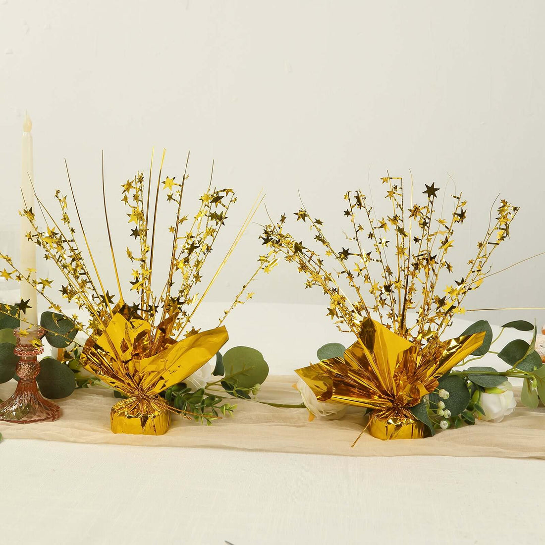 Gold starburst centerpieces for celebrations and events.
