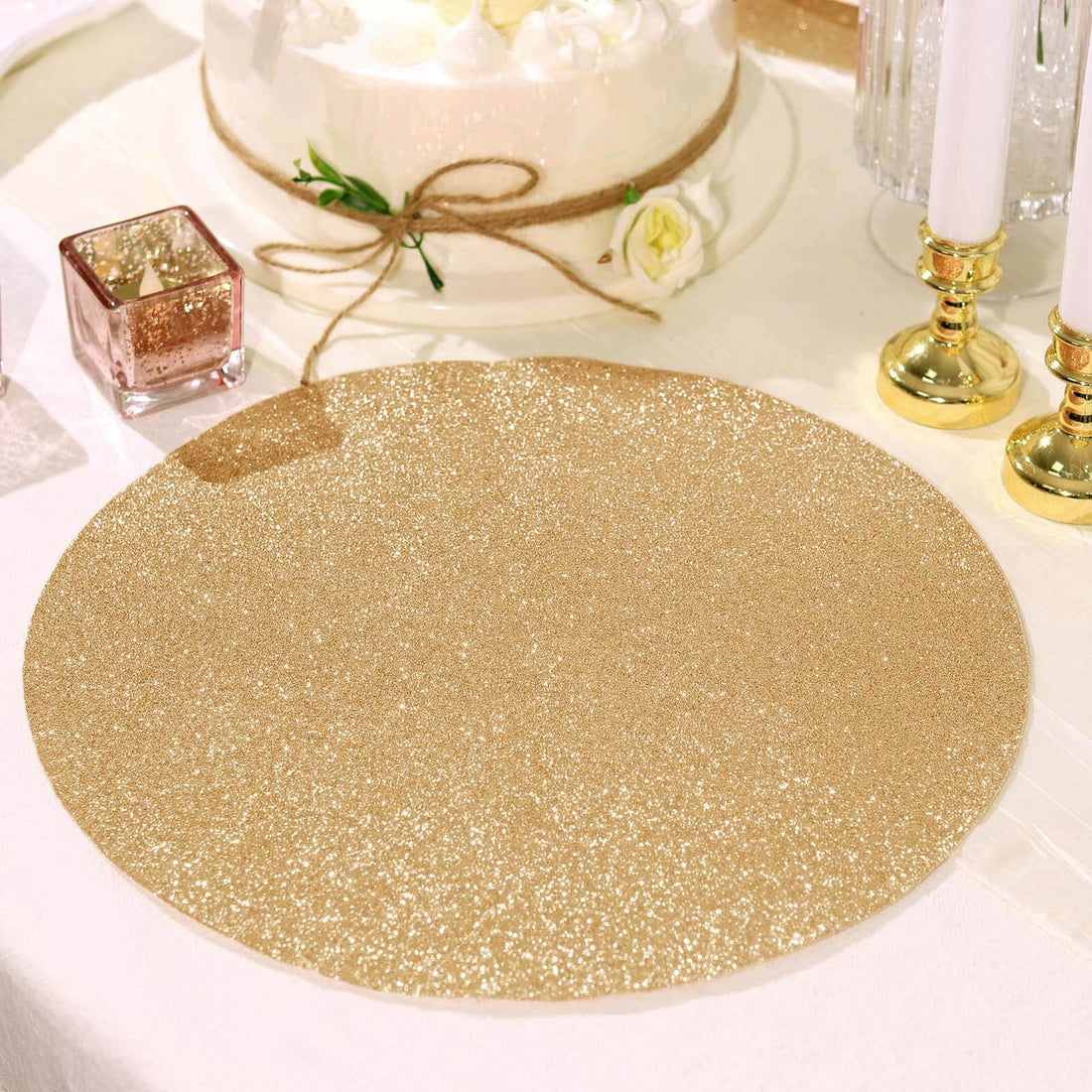 Gold glitter table runner on a beautifully set dining table.