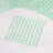 Green star-shaped embellishments arranged in a grid pattern.