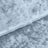 Soft blue textured fabric close-up showcasing its luxurious quality and detail.