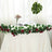 Rose and greenery table garland for events and decorations.