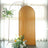 Decorative fabric backdrop with floral arrangement in a bright interior setting.