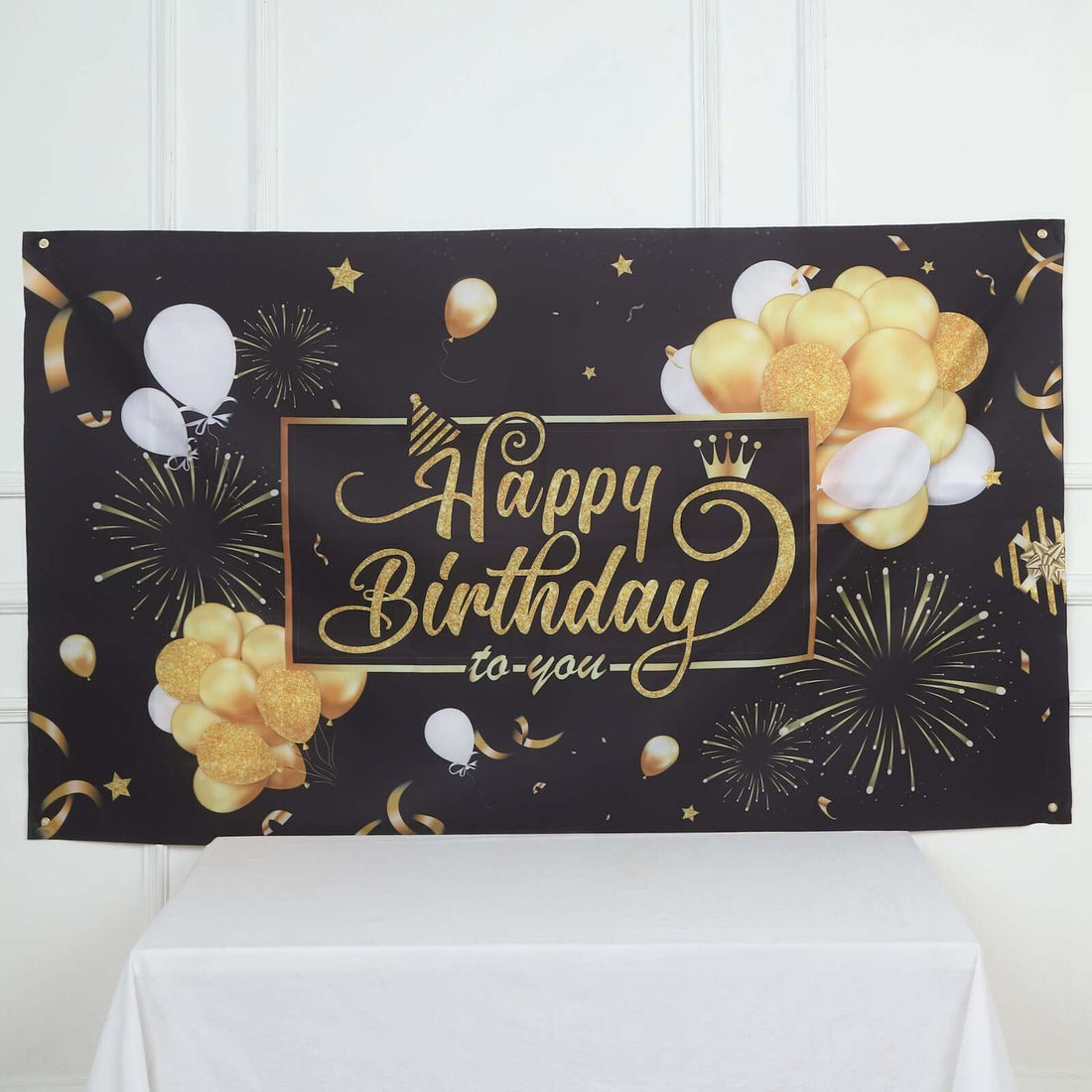 Happy Birthday banner with balloons and fireworks on a black background.