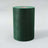 Green fabric roll on a plain background