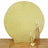 Gold glitter backdrop with elegant candle display for stylish decor.