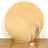 Large round backdrop with golden hue and elegant candle holder display.