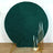 Teal glitter backdrop with gold candle holders and white candles.