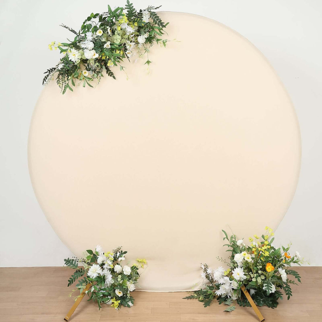 Floral backdrop with yellow and white flowers on a round canvas.