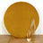 Gold circular backdrop with elegant candlestick display.