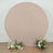Neutral round backdrop with floral arrangements on both sides.