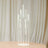 Modern glass candle holder with multiple transparent tubes for elegant decor.