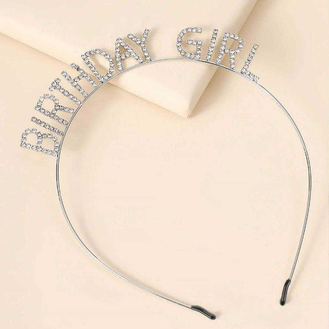 Rhinestone "Birthday Girl" headband on a light background.