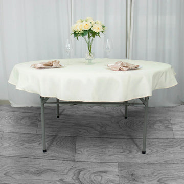 Elevate Your Event with the Ivory Seamless Premium Polyester Round Tablecloth