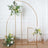 Decorative floral arch with gold frame and assorted flowers in a staged scene.