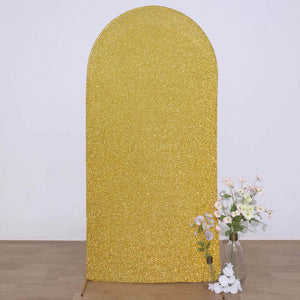 Gold glitter backdrop for photo shoots with decorative flowers.