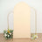 Neutral beige backdrop with gold frame and floral arrangements