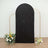 Black fabric backdrop with gold stand and floral arrangements at the base.