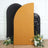 Mustard yellow backdrop with decorative flowers and sequined black screen.