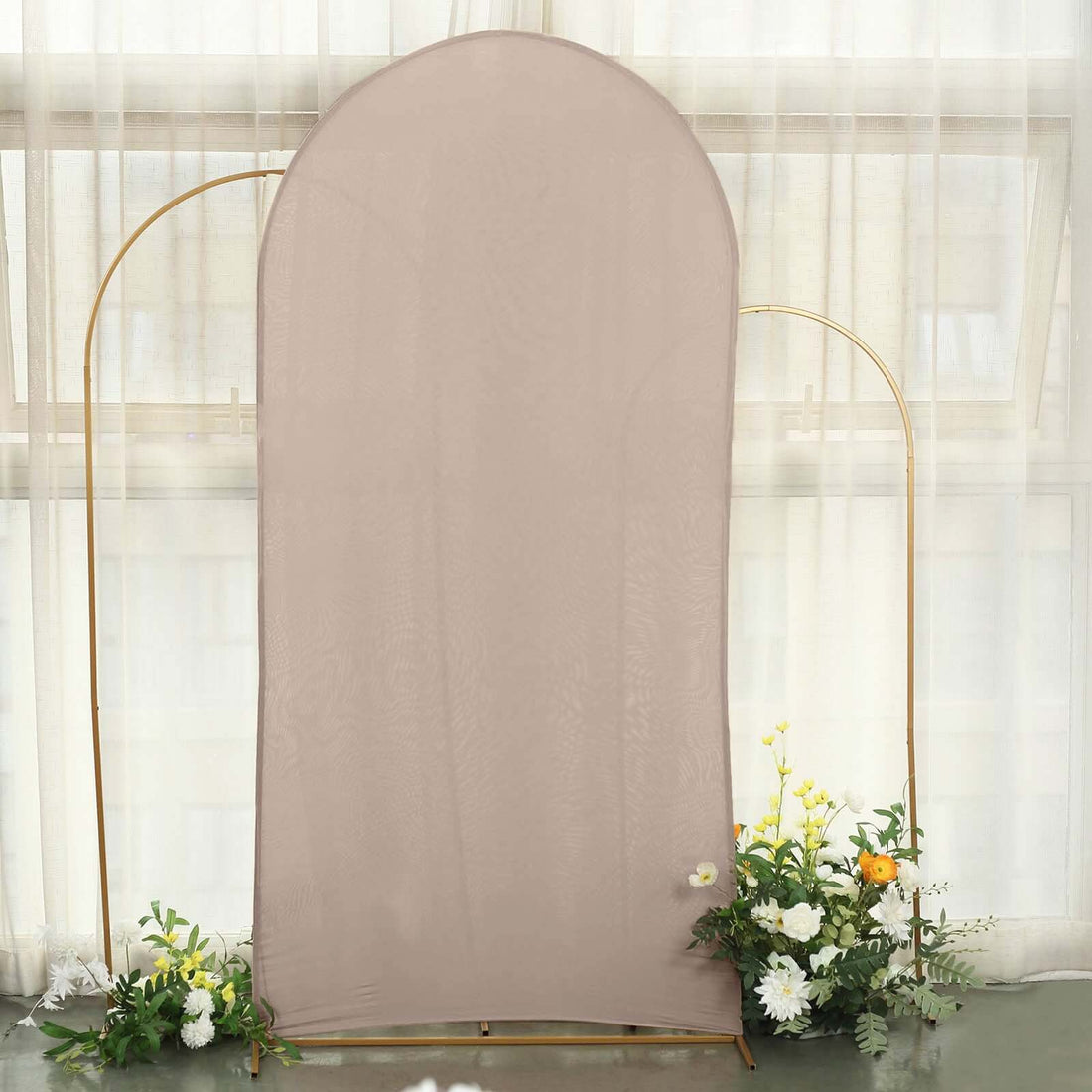 Neutral fabric backdrop with floral accents for photography