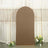 Brown fabric backdrop with gold frame and flowers at the base.