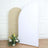 White backdrop with gold shimmer screen and flowers at the base