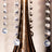 Crystal chandelier droplets reflecting light in elegant design.