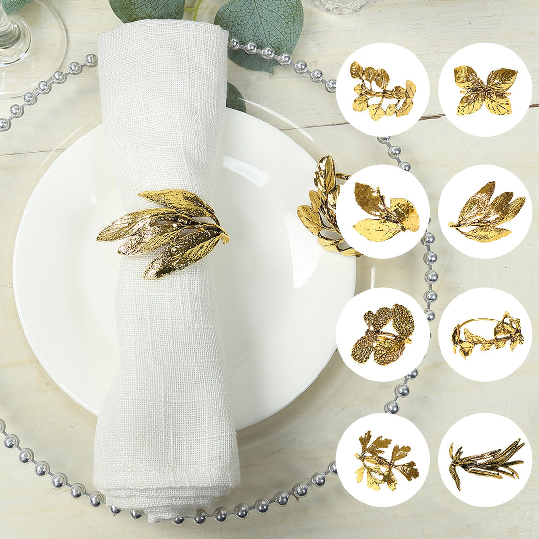 Gold leaf napkin rings displayed on a dining table setting.