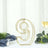 Gold number nine table centerpiece decor in modern design.