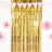 Gold fringe backdrop with pink decorations for parties and events.