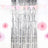 Pink party decorations with a shiny backdrop for celebrations.