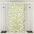 White floral backdrop with roses for events or photo shoots.