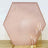 Hexagon sequin backdrop in rose gold with gold candle holders.