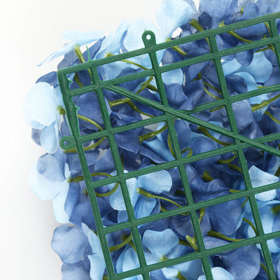 Artificial blue hydrangea flower garland on green plastic grid rack