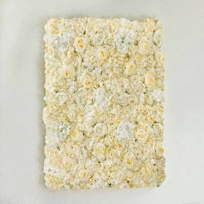 White floral wall art featuring roses and hydrangeas.