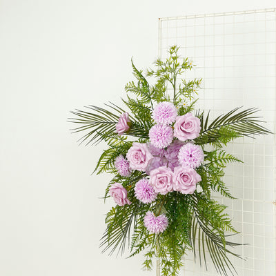Purple roses and chrysanthemums with greenery arrangement