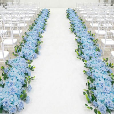 Blue floral wedding aisle with white chairs and elegant ceremony seating