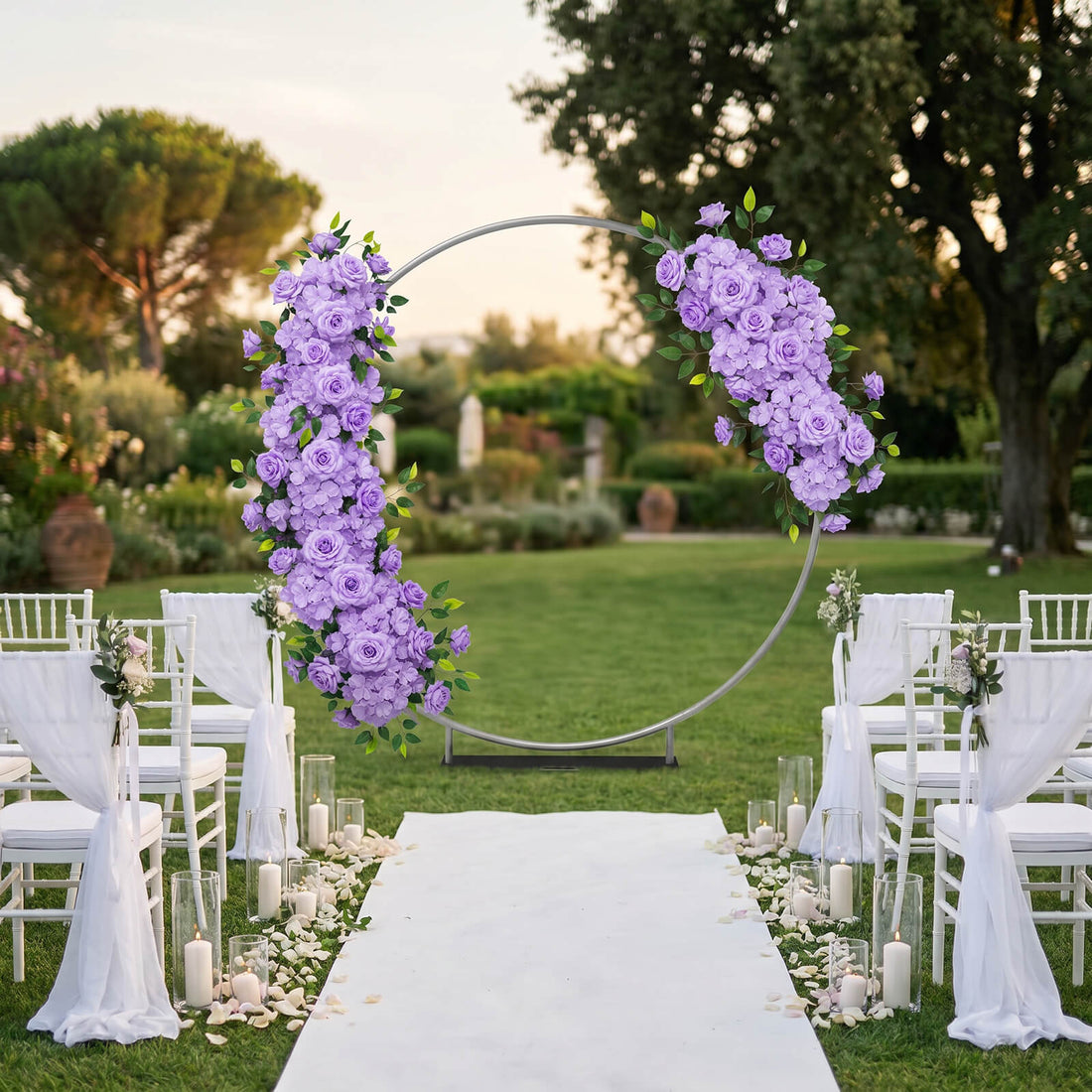 Lavender floral wedding arch in outdoor garden ceremony setup