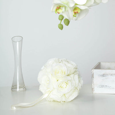 White floral bouquet with ribbon on a table