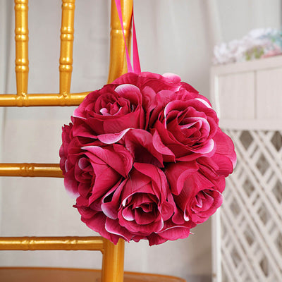 Pink rose bouquet hanging on a golden chair.