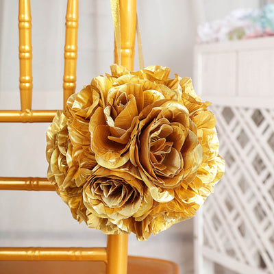 Gold floral decoration hanging from a chair