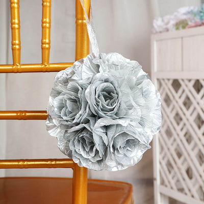 Silver flower bouquet hanging on a chair.
