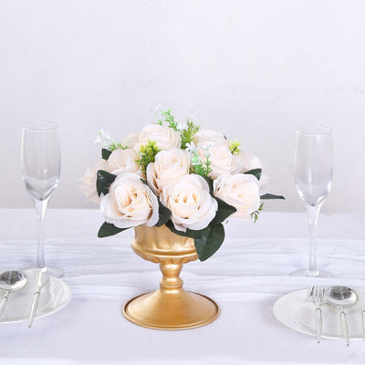 Elegant faux rose bouquet in a gold vase, perfect for table decor.