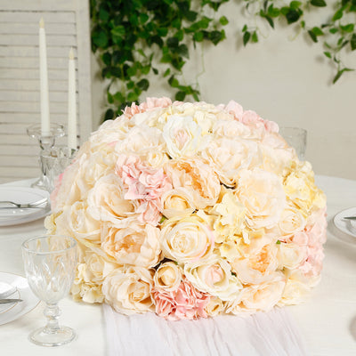 Floral centerpiece arrangement in soft pastel colors