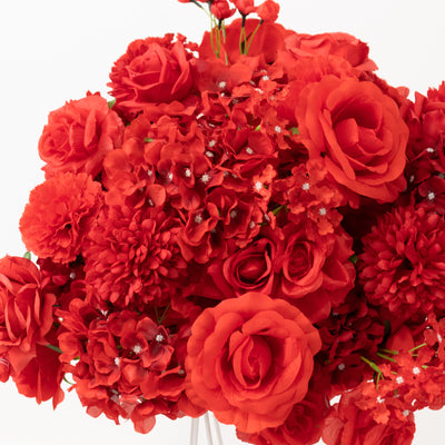Vibrant red artificial flower bouquet in full bloom