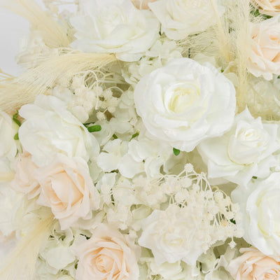 Elegant white and blush rose floral arrangement with soft cream accents#whtbkgd