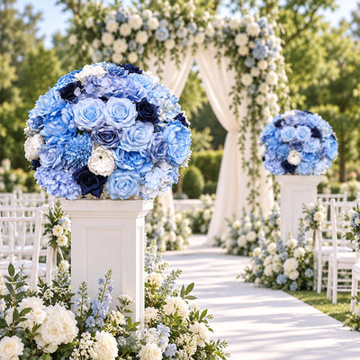 Blue floral wedding aisle with white arch and elegant outdoor ceremony decor