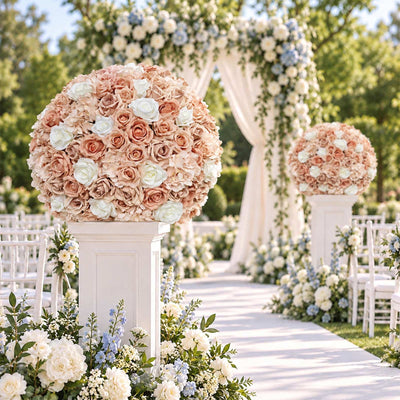 Elegant outdoor wedding aisle with pastel rose floral arrangements and archway